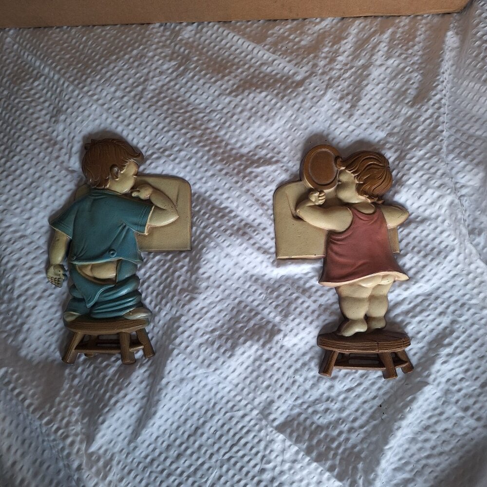 1966 sexton girl and boy wall hangings